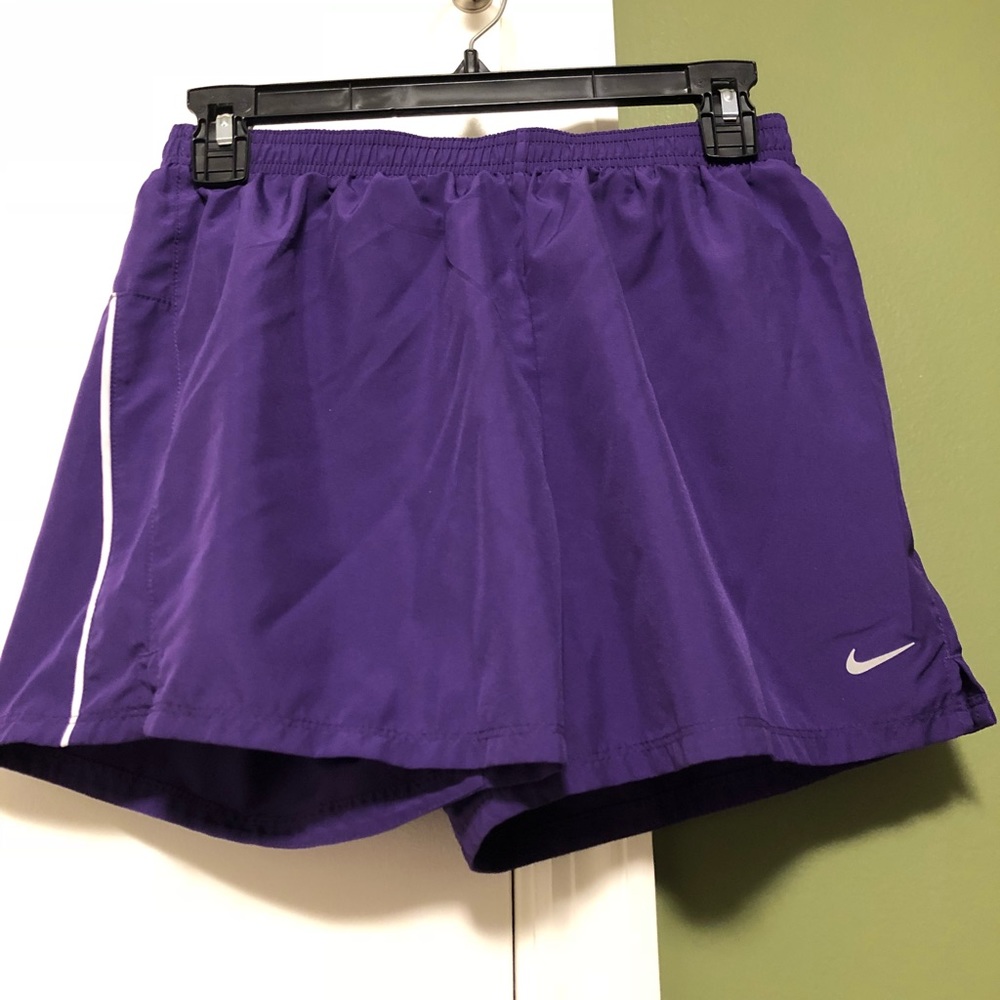 Purple Nike dri fit running shorts